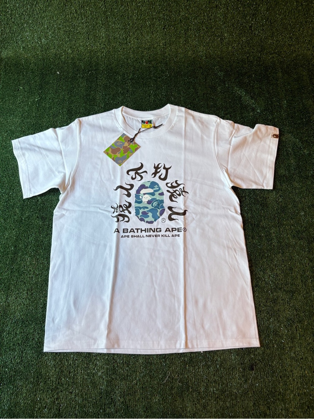 A Bathing Ape White Short Sleeve Tee with Blue/Green Camo Ape Head